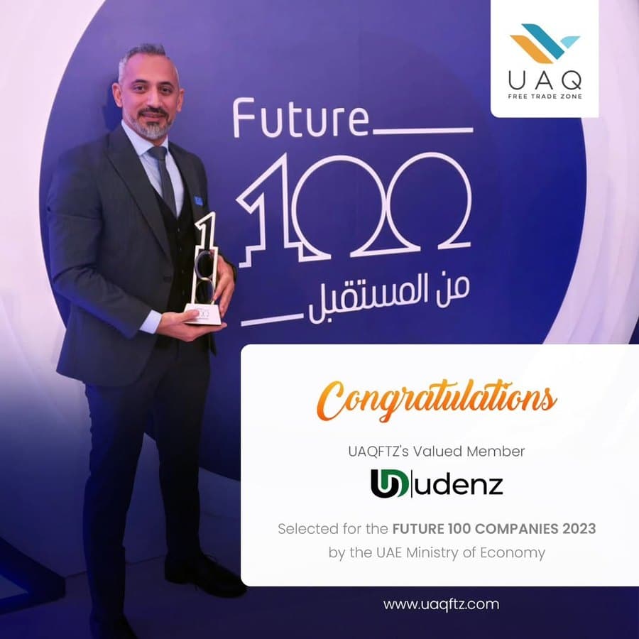 UAQ Free Trade Zone announcement: Udenz selected for the UAE Ministry of Economy's Future 100 Companies 2023, with a Udenz representative holding the award.